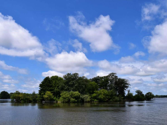 The roughly one-acre island sits in the Beaver Dam Lake in Dodge County.