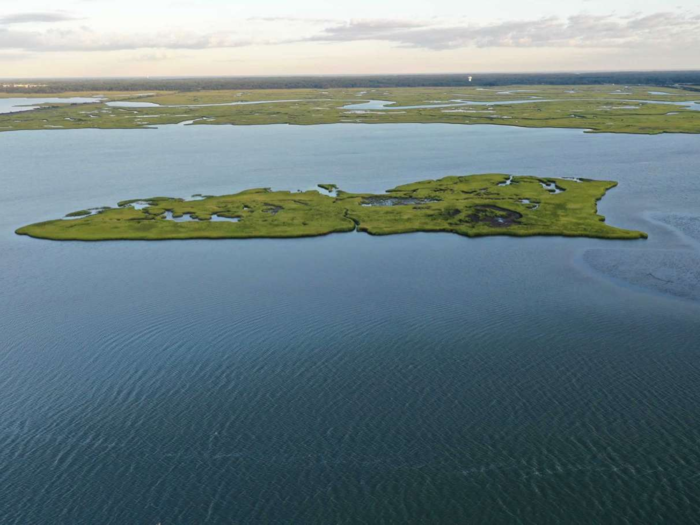 The 19-acre island is undeveloped. According to the listing, it