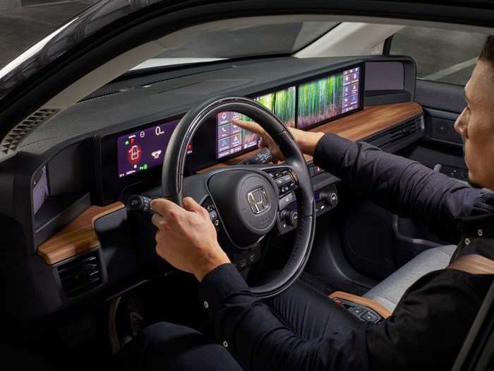 Spanning the full width of the car’s interior are five high-resolution screens, including dual 12.3-inch touchscreen displays.