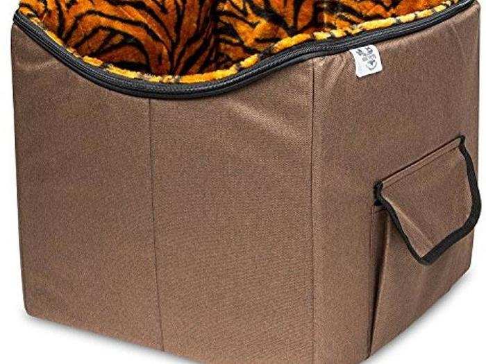 12. This pet booster seat with a tiger-striped lining