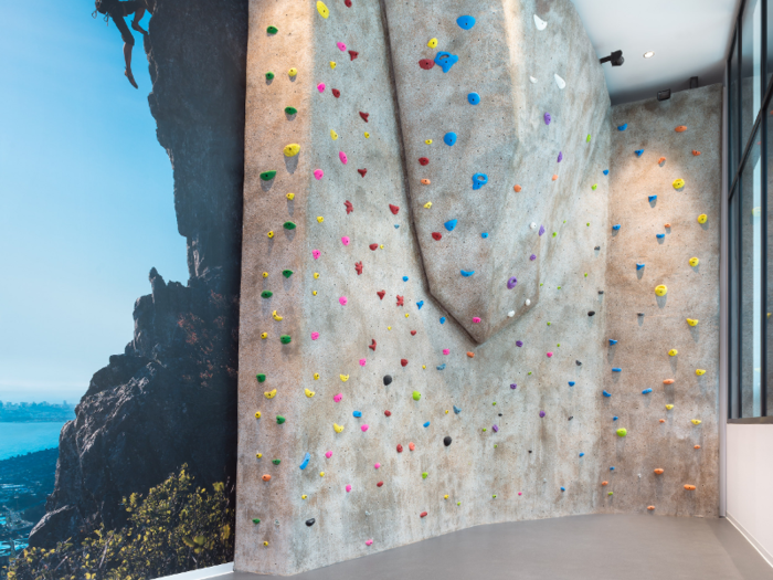 ... a fitness center with a climbing wall ...