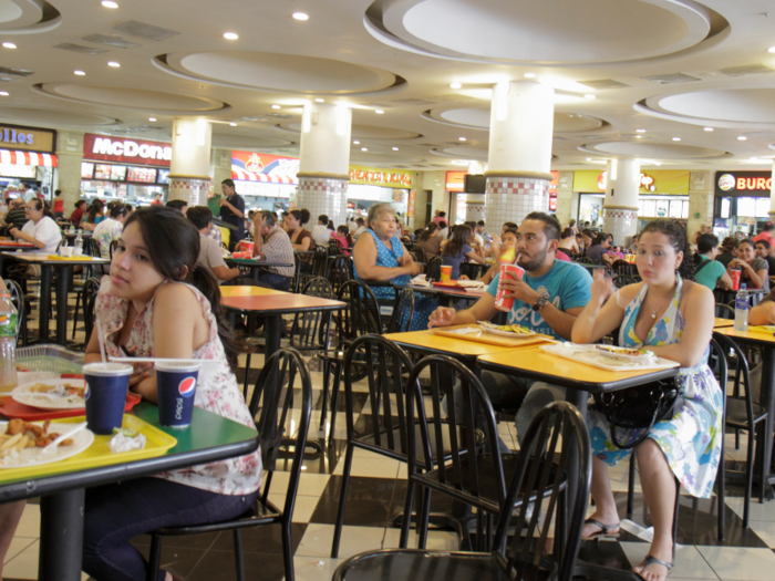 In years past, it would be difficult to find a seat in a busy mall food court.