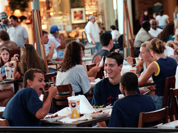 At the turn of the century, they continued to spend time in malls.