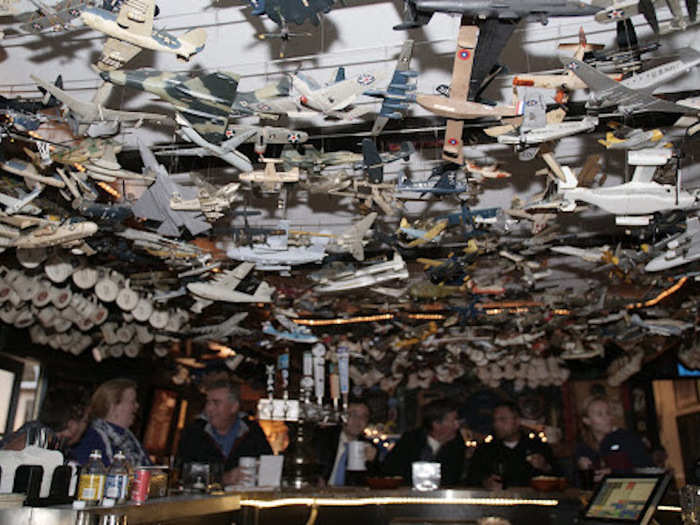 Model airplanes, many of them built by legendary former bartender Walter Simmons, decorate the ceiling.