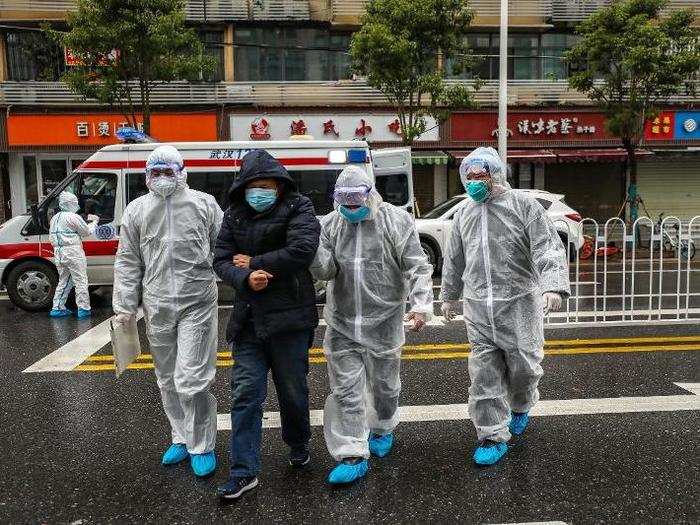 According to Chinese researchers in Hong Kong, one person with the new coronavirus can pass it to three to five others — a statistic called the virus