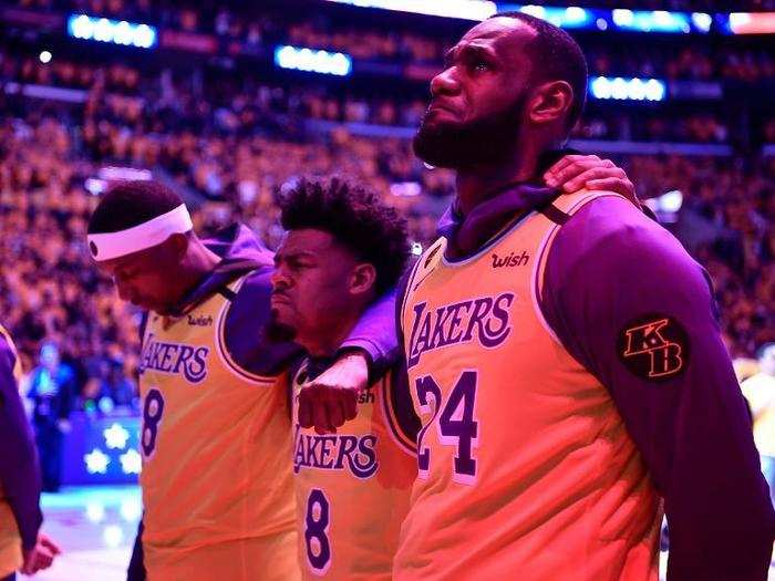  The Lakers wore purple warm-ups with Bryant