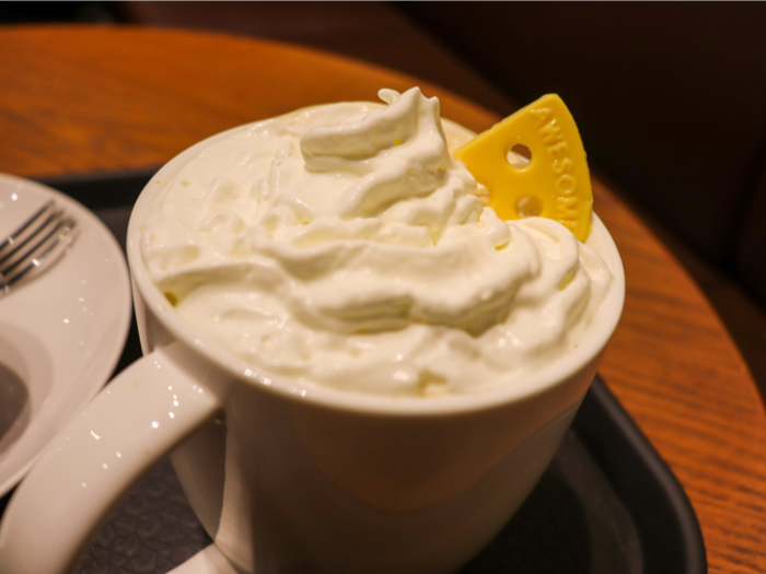 Yes, that is a cheese mocha. The limited-time offering, which rolled out to celebrate the "Year of the White Mouse" during the Lunar New Year, takes a sweet mocha and covers it with cheese whipped cream and a little faux Swiss cheese topper.