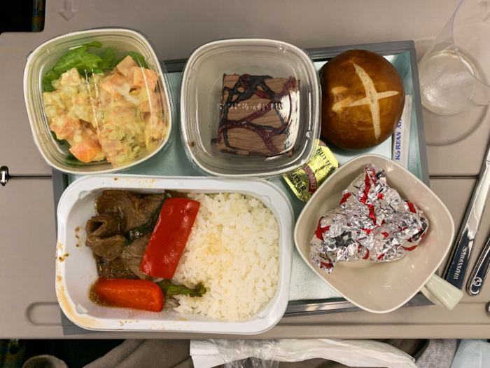 Hour 12 of the flight meant it was time for breakfast — or was it lunch? This meal was not quite as impressive as the bibimbap, with fairly standard beef and rice and a perfectly satisfactory roll.