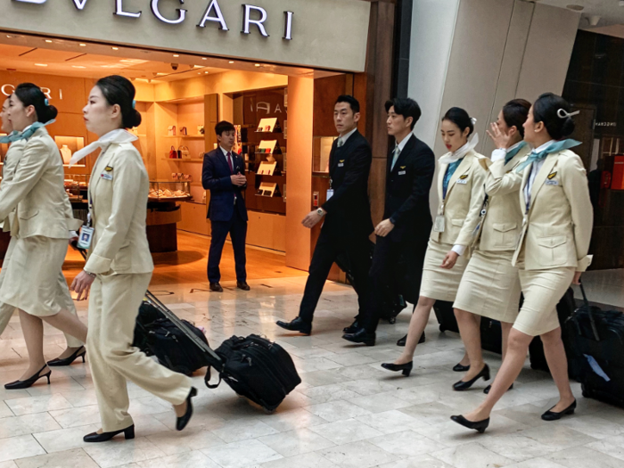 The number of — very chic — flight attendants needed to staff the flight also helps give some idea of how big the plane is. It takes a lot of staff to deal with more than 400 passengers.