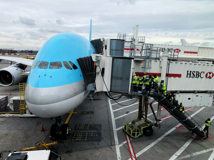 When the A380 arrived, I was eager to get a look at the plane that I would be trapped in for the next 14 hours. It was hard to capture just how massive the superjumbo jet is, but the two gates and the long line of people waiting on the stairs give some perspective.