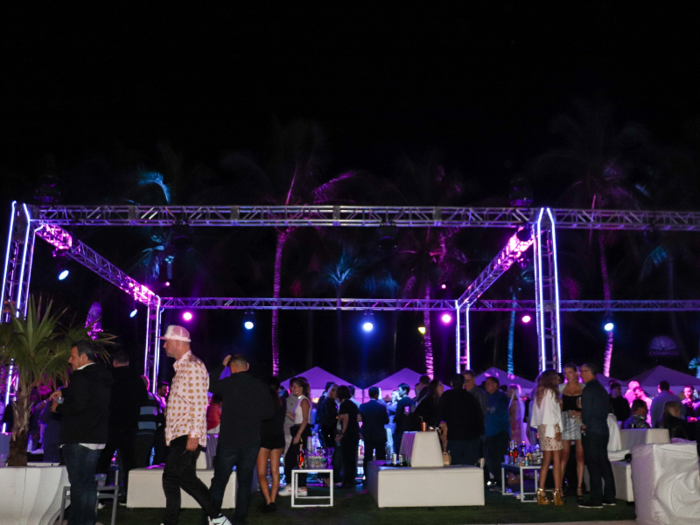 The general admission area had tables and seating areas, several open bars, and elevated platforms that would soon so people dancing on them.