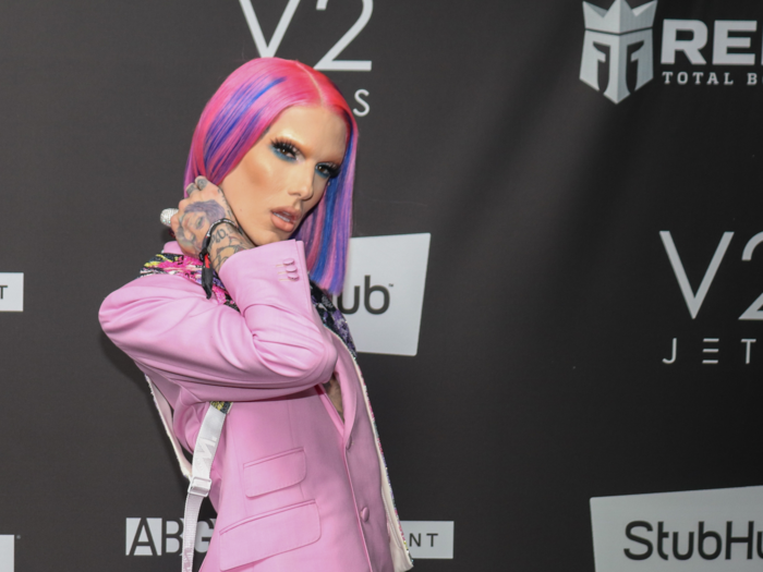 YouTuber and makeup mogul Jeffree Star wore a bright pink suit.