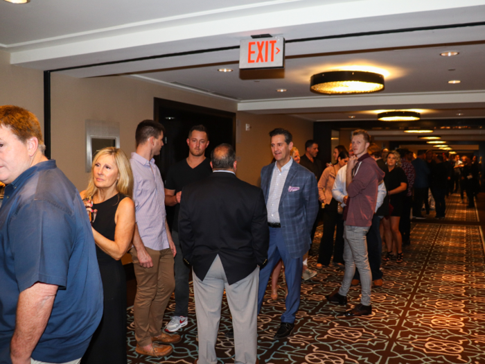 A long line of people stretched down the hallway. Each of these people had paid a minimum of $500 to be there.