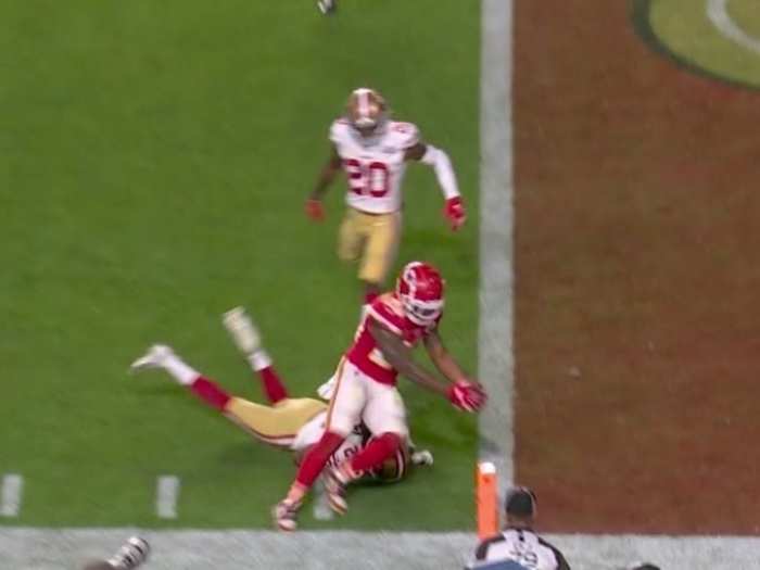 The touchdown was reviewed to see if he stepped out before crossing the line, but the call stood. It was close.