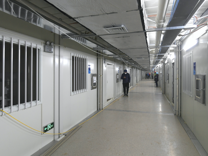 The building contains special ventilation systems and double-sided cabinets that connect patients