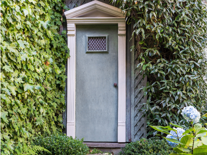 Small details add to the appeal of this outdoor area, from this partially hidden door...