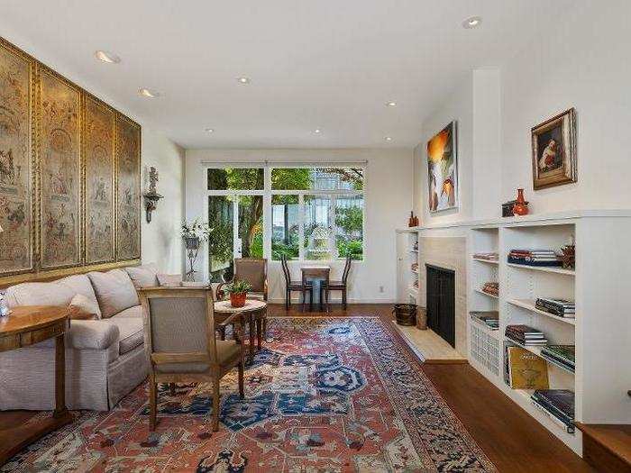 The foyer separates the dining room from the living room, seen here.