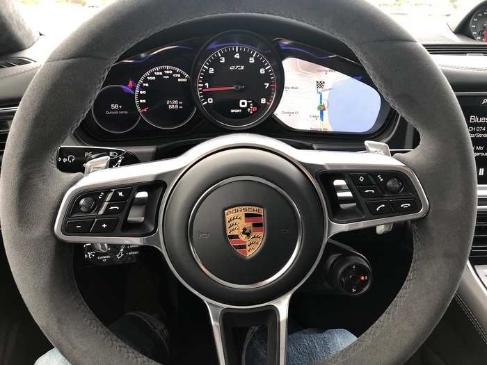 The multifunction steering wheel is Alcantara-wrapped and stupendously responsive. There are paddle shifters, a customizable instrument-cluster display with the tachometer front and center, and ...