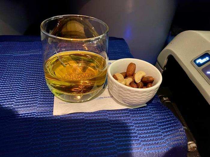 A few minutes after takeoff, the flight attendants came through with drinks — I went for a Glenfarclas scotch. They also took our lunch orders.