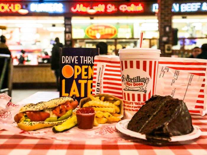 My order came out in a flash: a beef hot dog ($3.29), a slice of chocolate cake ($3.19), small fries ($2.29), and a small strawberry shake ($3.59).