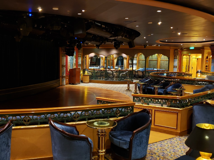 Once-thriving common areas on the ship, like the bar, appear to be empty.