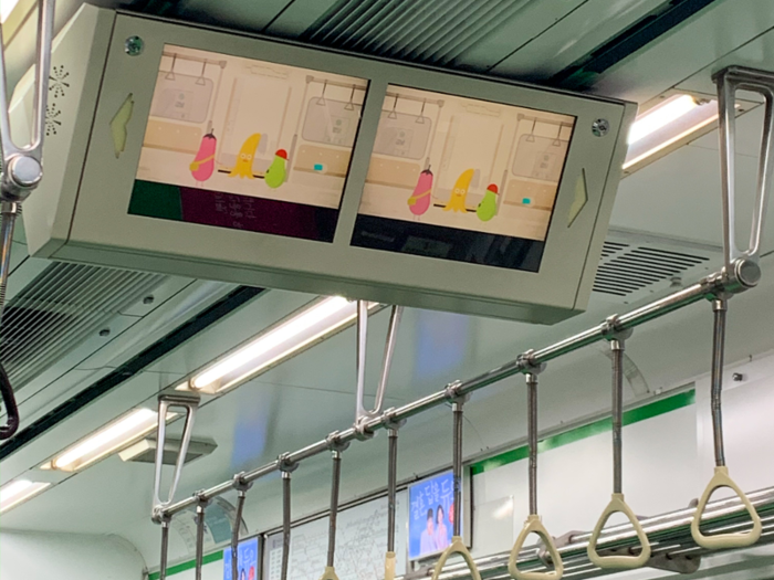 On some lines, the screen additionally plays informational videos about the subway system.