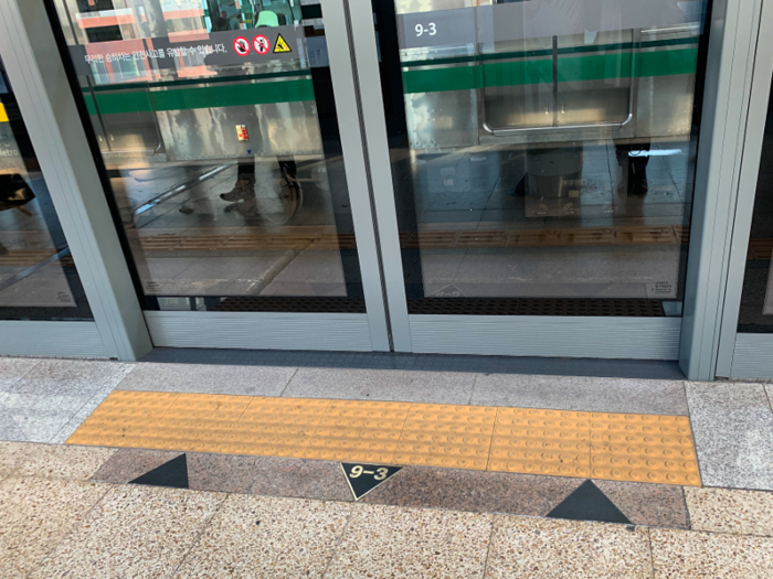 Boarding the train is a far more organized affair than in New York.