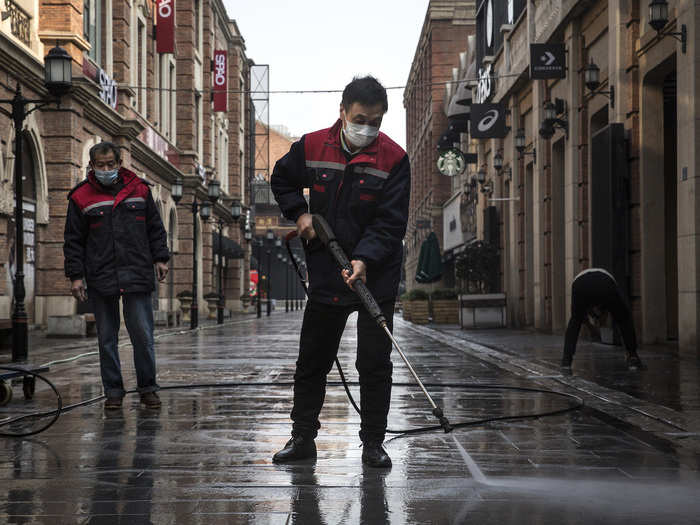 The streets and the inside of buildings are sprayed with disinfectant to try and stop the virus from spreading.