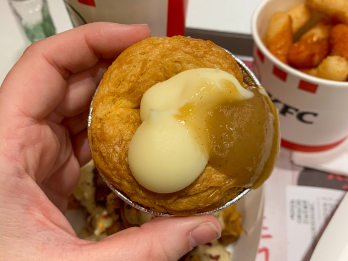 The dish is basically a pastry topped with a dollop of mashed potato and a dollop of gravy. The potato is whipped and strangely sweet — I think it might have cream cheese in it? — and the gravy doesn