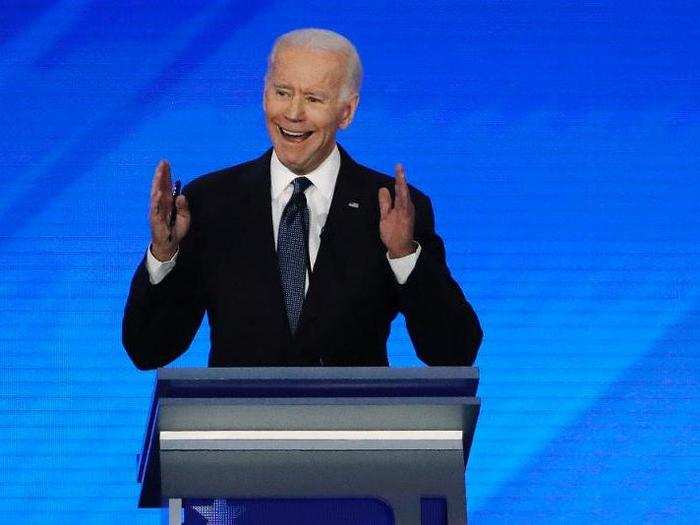 Biden got the debate hall to rise to a standing ovation for Lt. Col. Alexander Vindman, the National Security Counsel official who testified in Trump