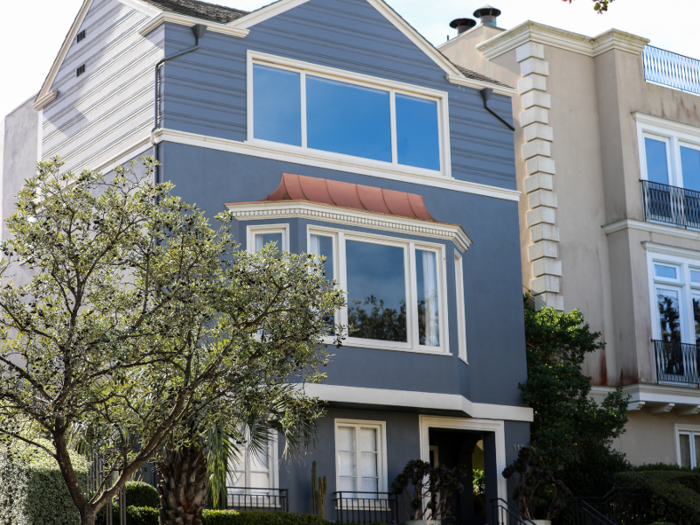 A few doors down and across the street is this two-story, five-bedroom house that doesn