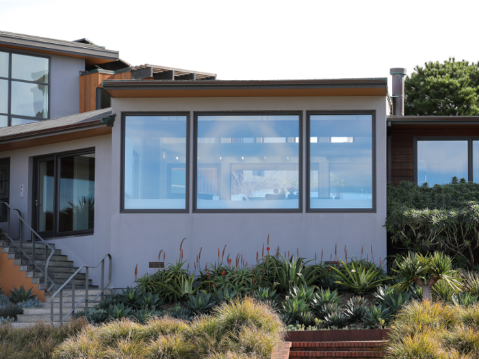 The two-story home was originally built in 1951 and has three bedrooms and three bathrooms.