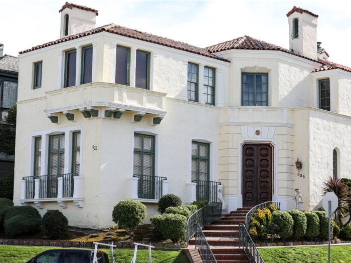 Zillow estimates that this two-story yellow home built in 1927 with 12 rooms is estimated to be worth $5 million, though it