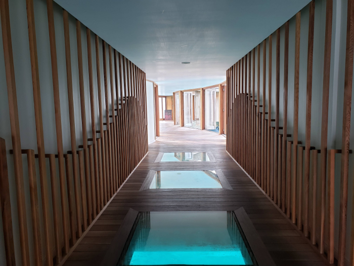 The glass-floor walkway wows guests even before they step inside.