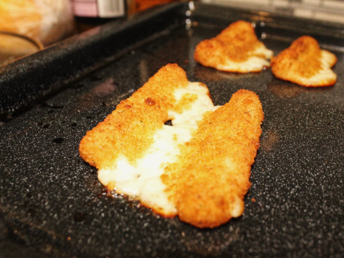 The gooey mozzarella cheese had completely melted out of the sticks and onto my pan.
