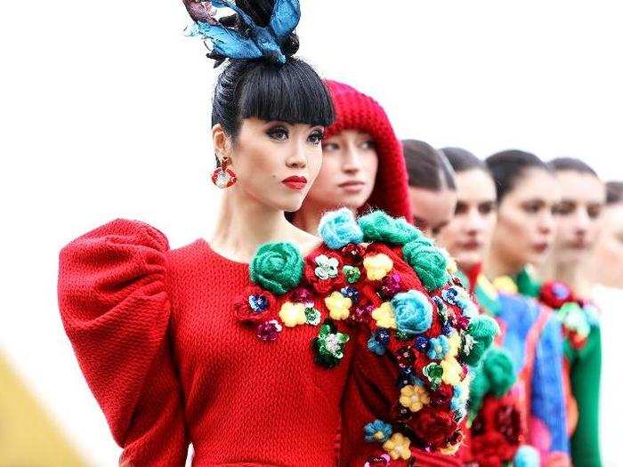 Anh closed the show in this red structured dress with hundreds of woolen flowers.