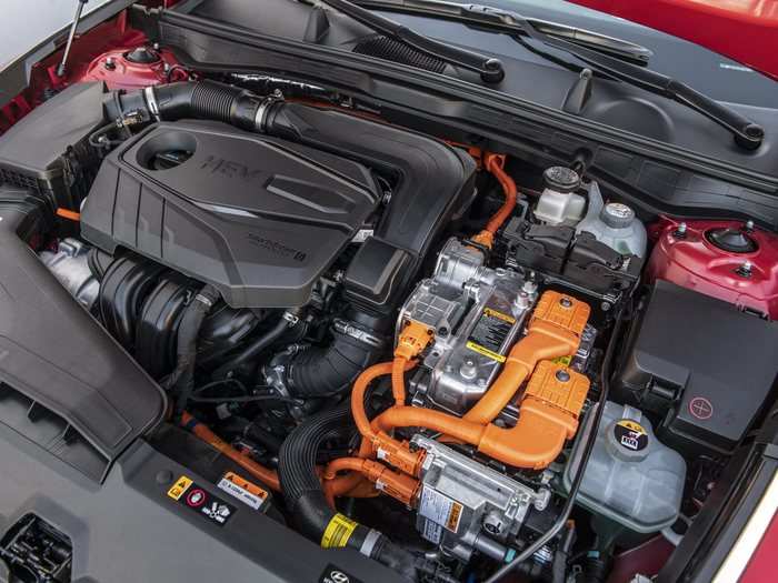 The car is powered by a 2.0-liter, four-cylinder engine working alongside an electric motor.