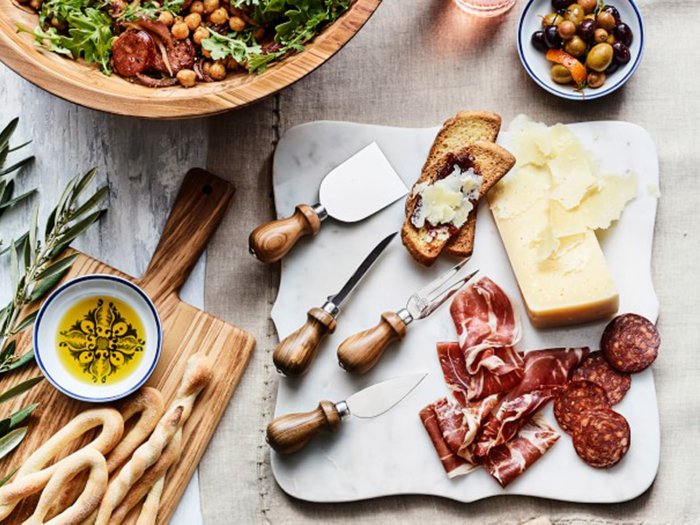 A set of olive wood cheese knives