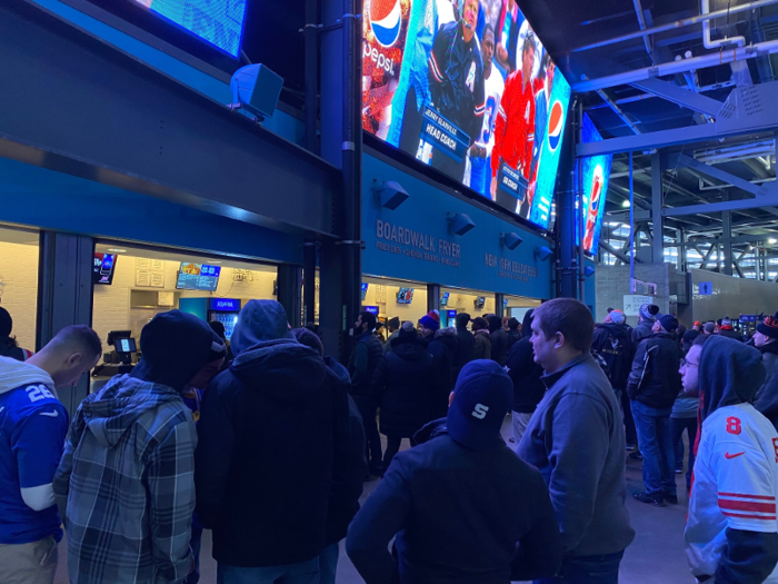 Around the concourse, it felt like any other football game, with fans in line for concessions and beer.