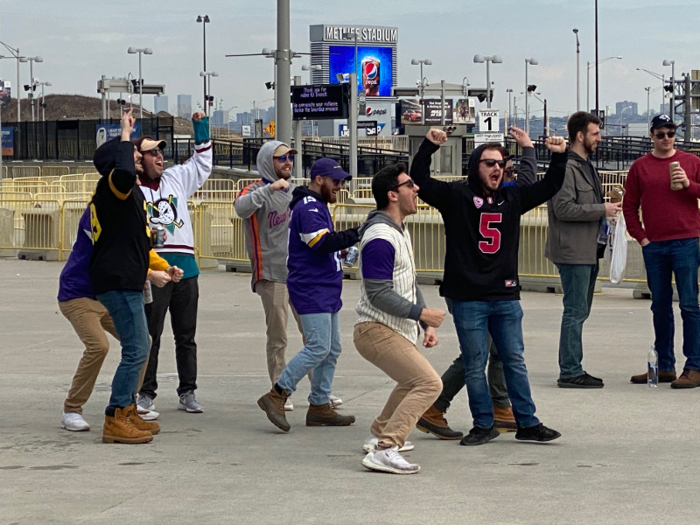 As we made our way off the bus, a particularly rowdy group of Guardians fans cheered our arrival while they waited in line by a porta-potty. Chants of "Let