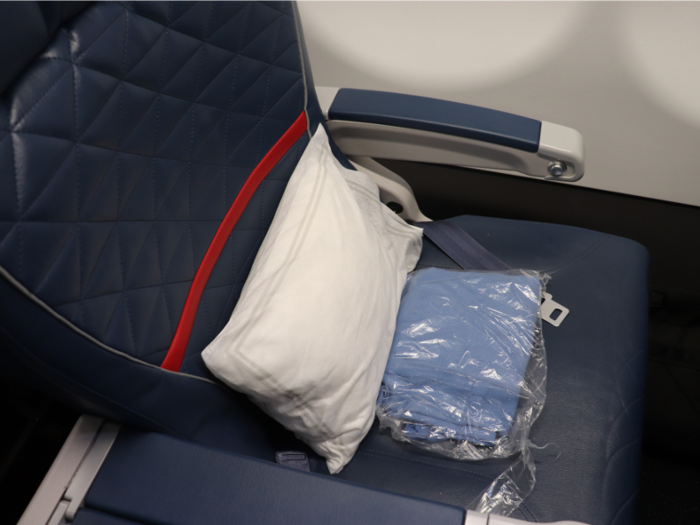 Each seat also had pillows and blankets placed on them...