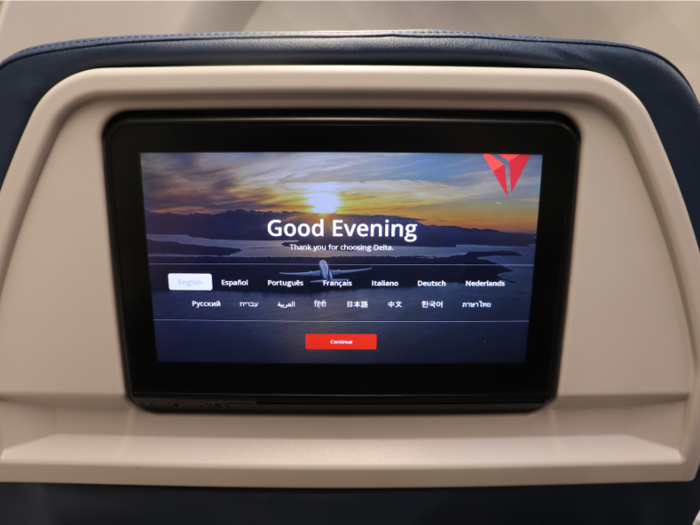 Seatback in-flight entertainment screen with additional USB charging ports...