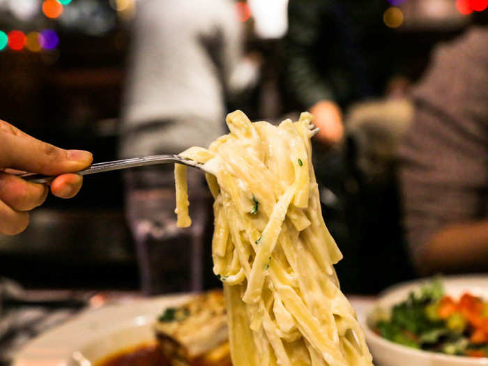 The pasta was dense and thick, and the cream was rich.