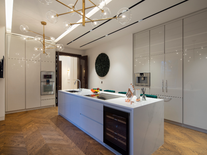 Off the dining room is the "family kitchen," which has Gaggenau appliances. There