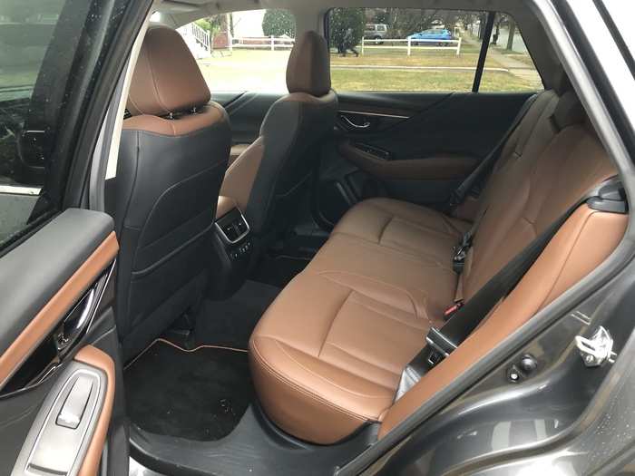 The rear seats are a bench design and could handle three passengers, although I never had more than two. Legroom is respectable.