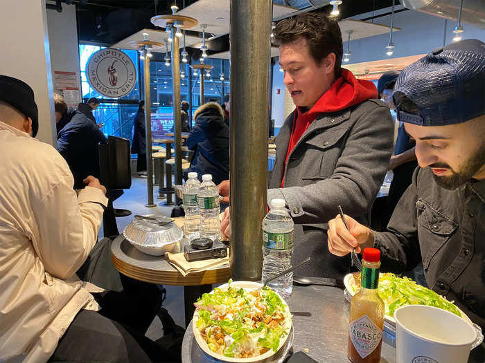 After recording the podcast, we head to grab lunch at a nearby Chipotle. As we eat, Saleh pulls out his computer to upload content to YouTube and to ensure it