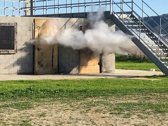 While most of the other charges create a fiery explosion, the water charge, which will fold in a metal door like paper, creates a cloud of mist.