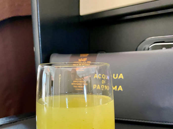 A flight attendant came by and offered me a welcome drink — I opted for the lime-and-mint juice that Etihad stocks on flights out of Abu Dhabi.