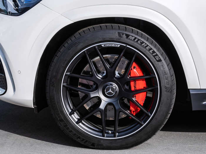 ... and standard 22-inch wheels fitted with massive red brake calipers.