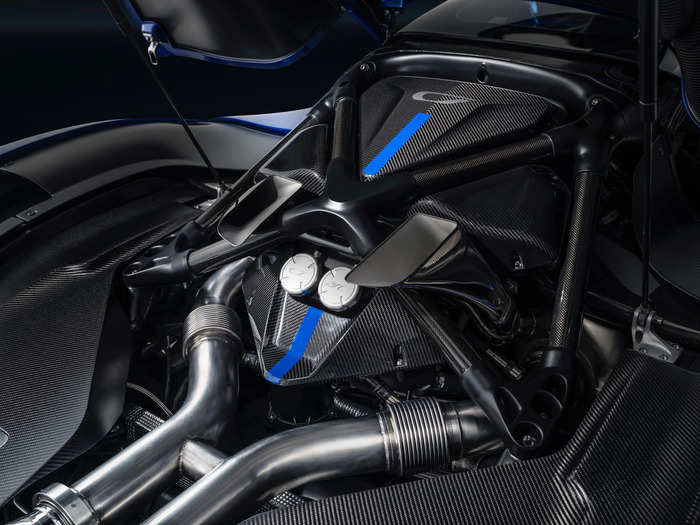 All together, the hybrid powertrain — which drives all four wheels — cranks out a ludicrous 1,250 horses at 10,500 rpm.